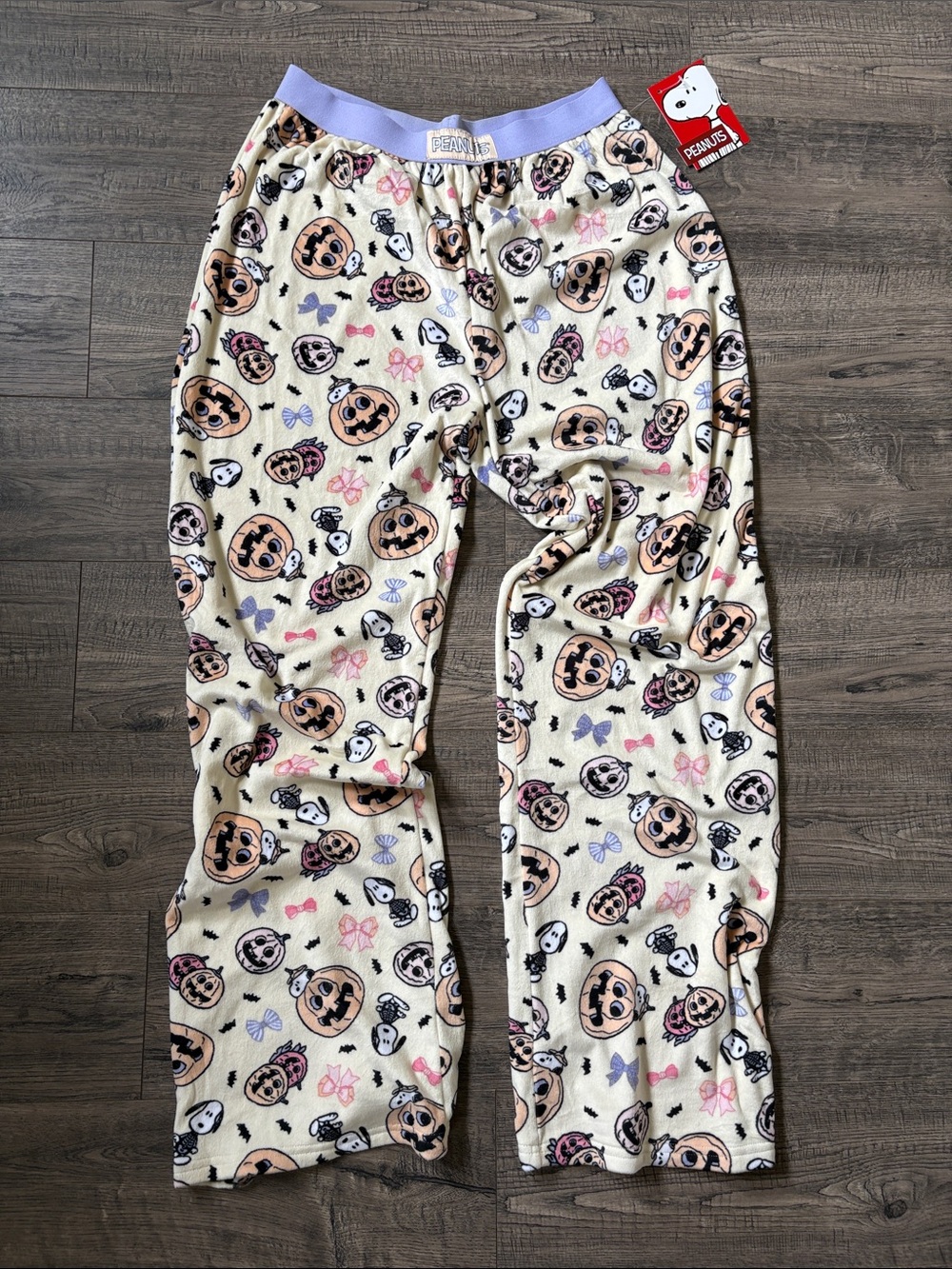 Peanuts Cream Pajama Pants with Purple Waistband and Pink Bow Accents